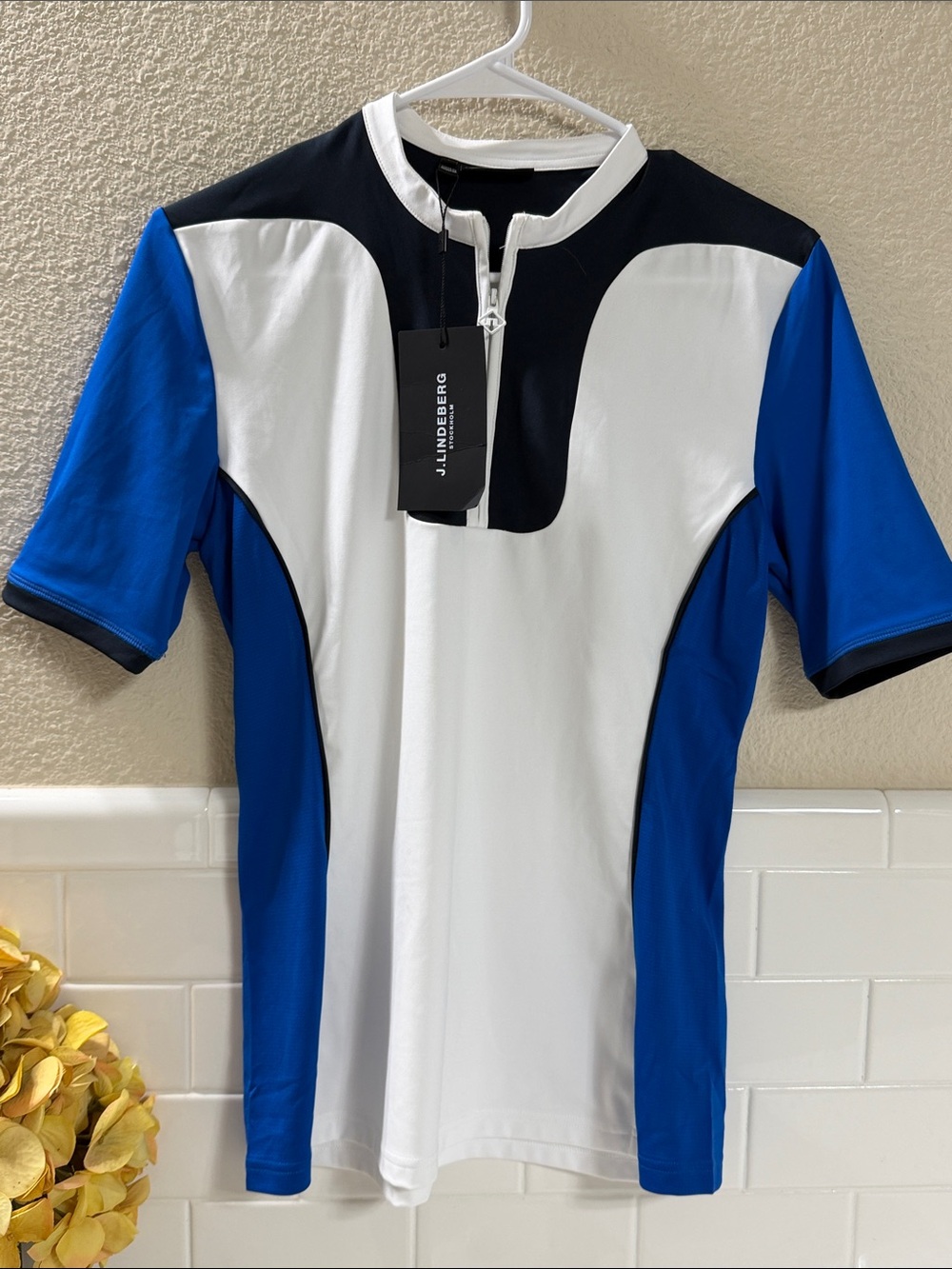 J. Lindeberg Golf Polo Shirt.  Top lapis Blue New with tags .